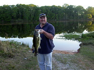 Eddie from Pelham, AL, with a big bass, summer of 06