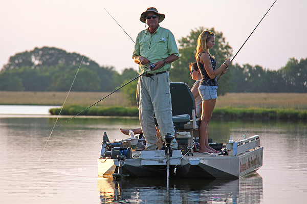 Manager Wilson with two of his bass fishing students from Judson College, 2012