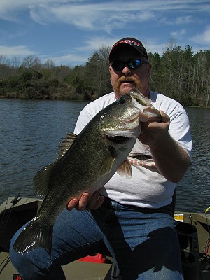 John Nolan with big bass, July 08