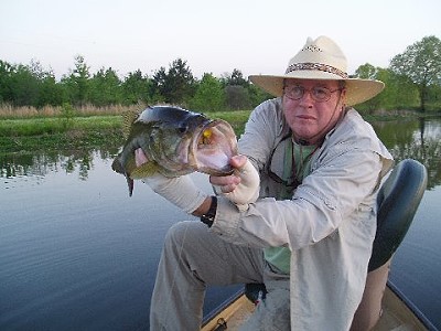 Everett Sharp with 6 3/4 lb bass on flyrod