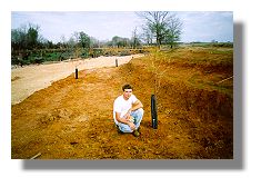 Michael Woodfin planting ball cypress in Snag Lake