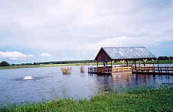 Party pier on Sturdivant Lake with aerator